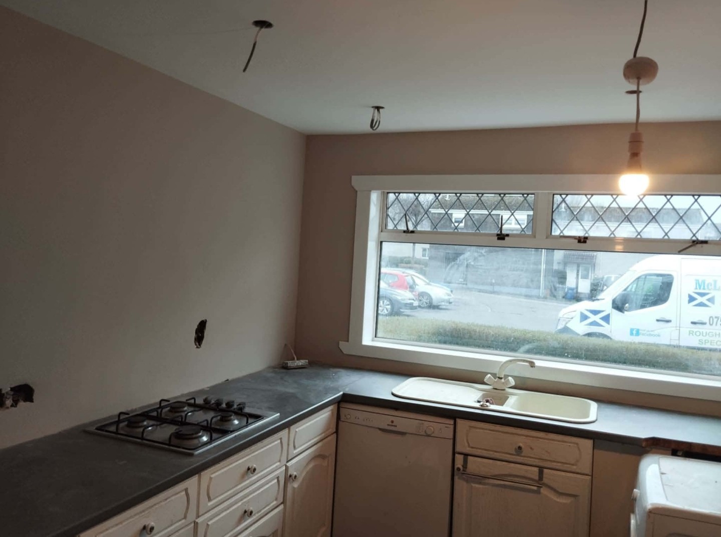 Job D after: finished kitchen with repaired walls